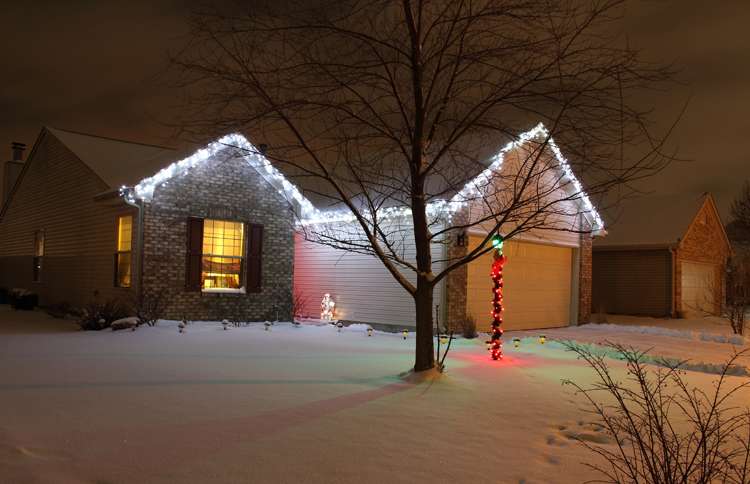 Guideposts: A modest home with a single string of white Christmas lights